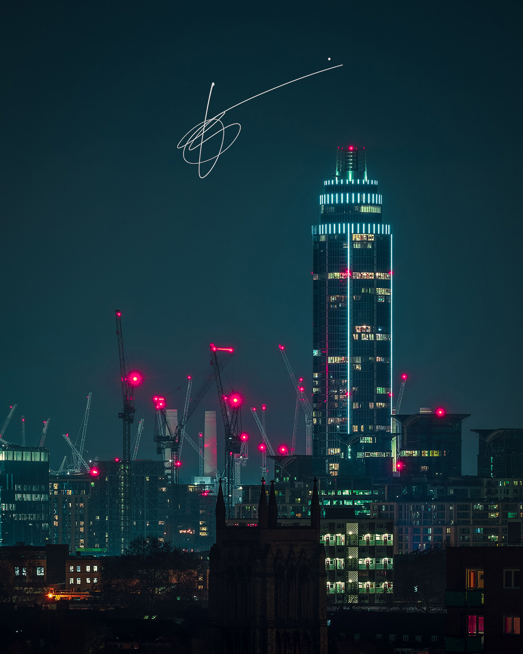 a panoramic view of the Vauxhall tower in London at night