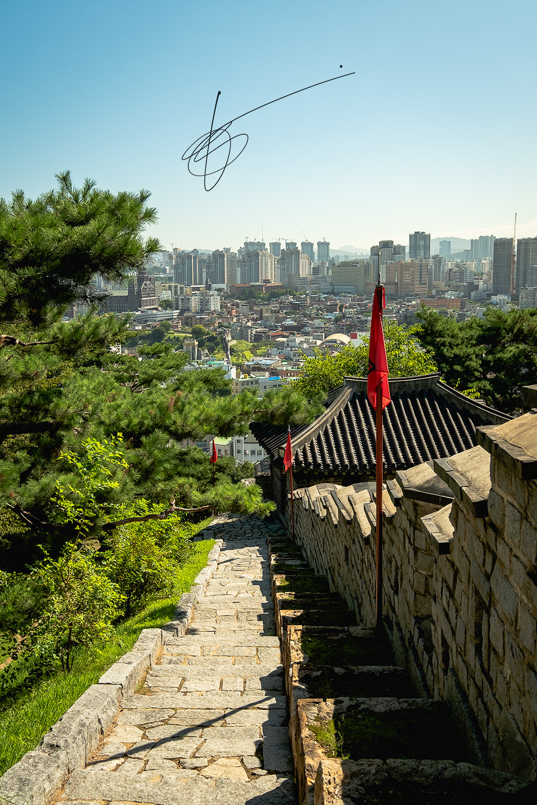 Suwon. The steep steps to climb on top of the walls of the Suwon fortress