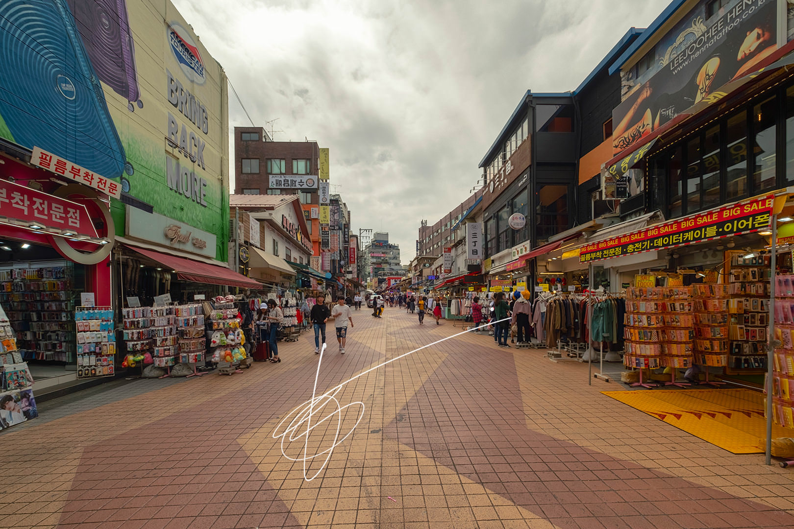 A pedestrian market street in the Hongdae district in Seoul
