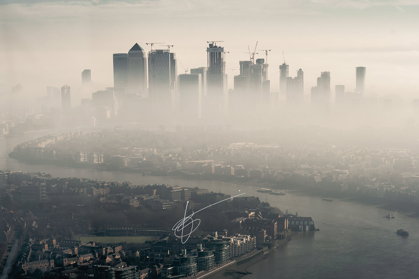panorama of London surrounded by fog
