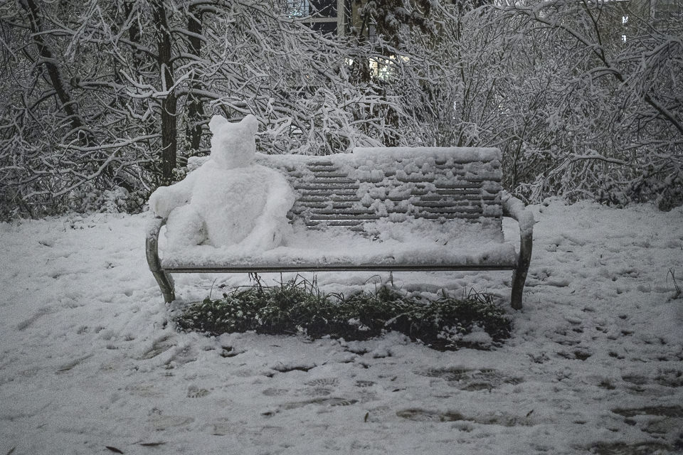 Xmas snow in London, Mile End park, Bear snowman sitting